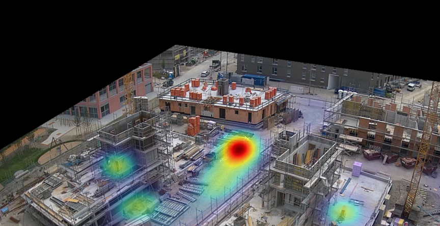 Das Wärmebild zeigt eine Baustelle von oben. Darin eingezeichnet sind die Orte auf der Baustelle, an denen Wärme abgegeben wird.